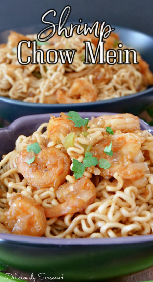 Two bowls filled with shrimp chow mein showing the ramen noodles and shrimps on top.