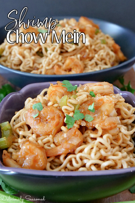 Two bowls with a serving of shrimp chow mein in each bowl.