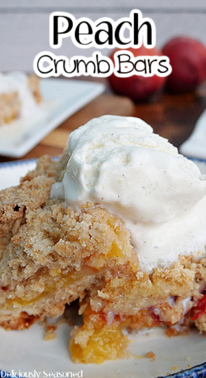A white plate with peach crumb bars and a scoop of vanilla ice cream on it and the title of the recipe at the top of the photo.