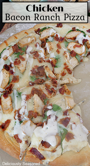 A picture of chicken bacon ranch pizza sliced on the pizza pan with the title at the top.