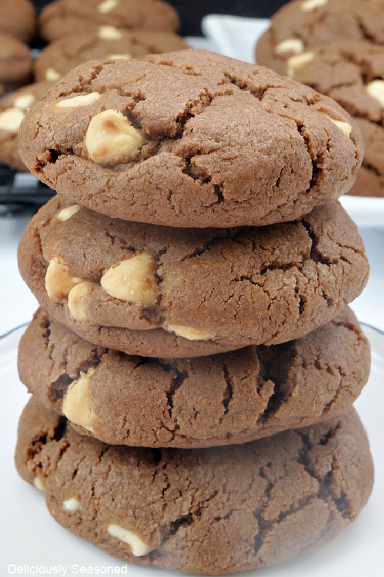 Four chocolate cookies stacked on top of each other.