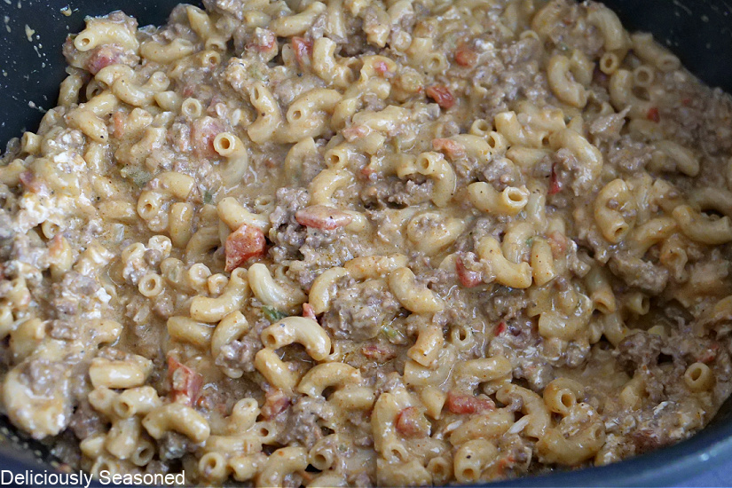 A saucepan with the easy ground beef pasta in it before serving.