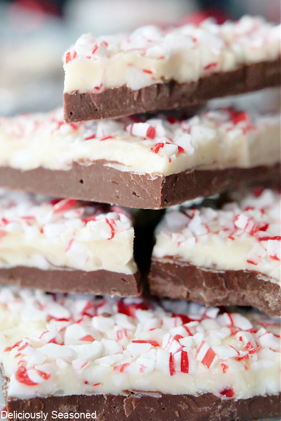 A close up picture of peppermint bark showing the layers of milk chocolate and white chocolate.