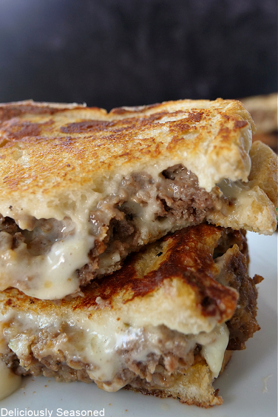 A meatloaf grilled cheese with melted pepper jack cheese on it.