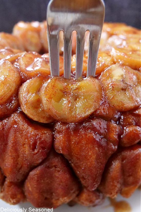 Monkey Bread with a fork sticking into a piece.