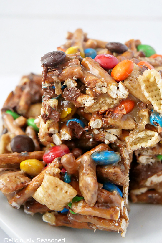 A close-up picture of Chex Mix Bars with pretzels and M&Ms.