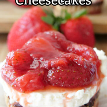 A mini cheesecake on a white plate with strawberries on top and fresh strawberries in the background with the title at the top of the picture.