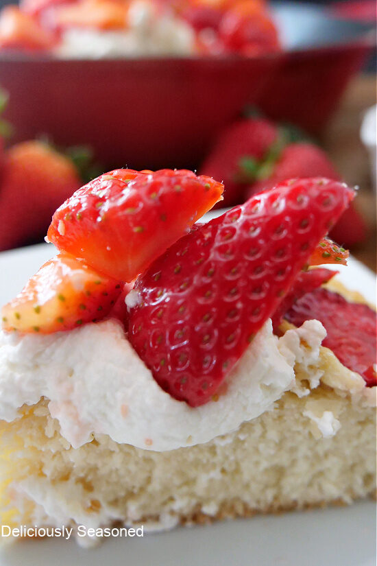 A close up picture of a slice of strawberry shortcake.