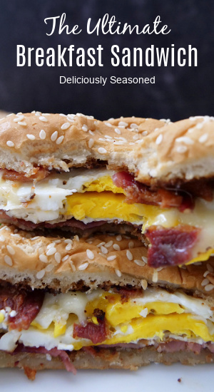 A title picture of an ultimate breakfast sandwich stacked up on top of another.