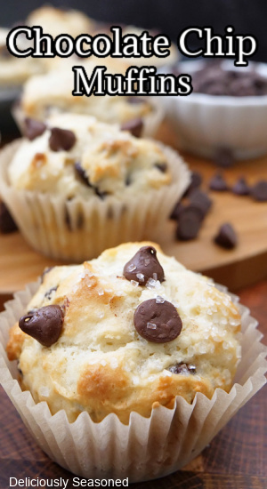 A chocolate chip muffin topped with coarse sugar.