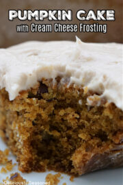 A slice of pumpkin cake with cinnamon cream cheese frosting.