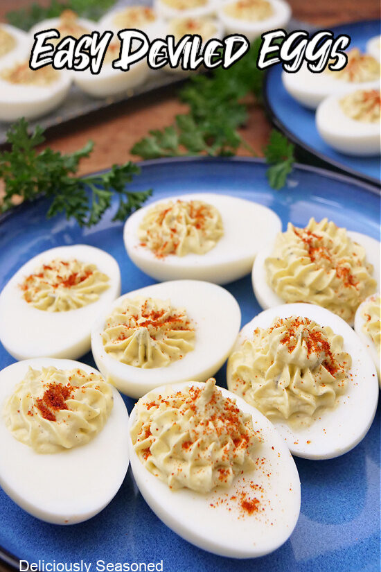 A blue plate with deviled eggs on it.
