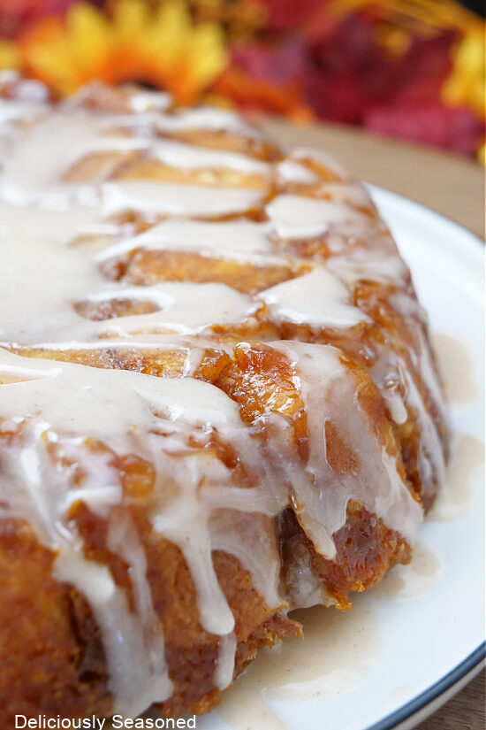 A close up of one side of the monkey bread showing the glaze drizzle.