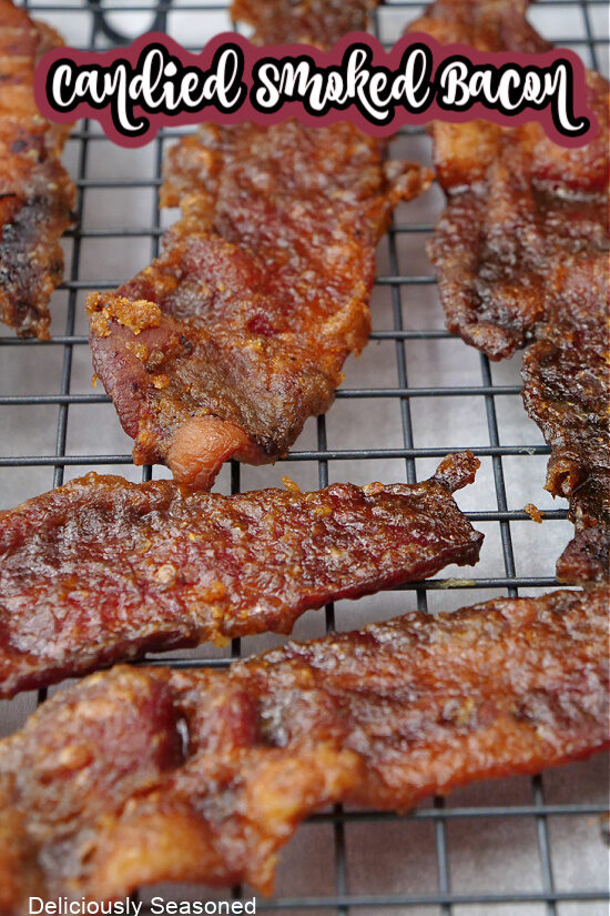 Candied bacon on a wire rack cooling.