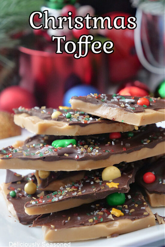A white plate with a stack of Christmas toffee on it.