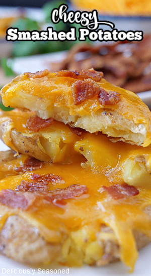 A close up of a few potatoes with cheese and bacon on them with the title of the recipe at the top of the photo.