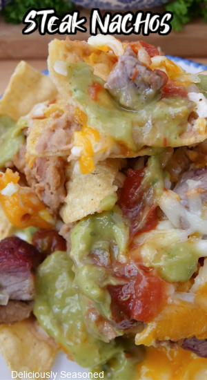 A close up of a stack of nachos.