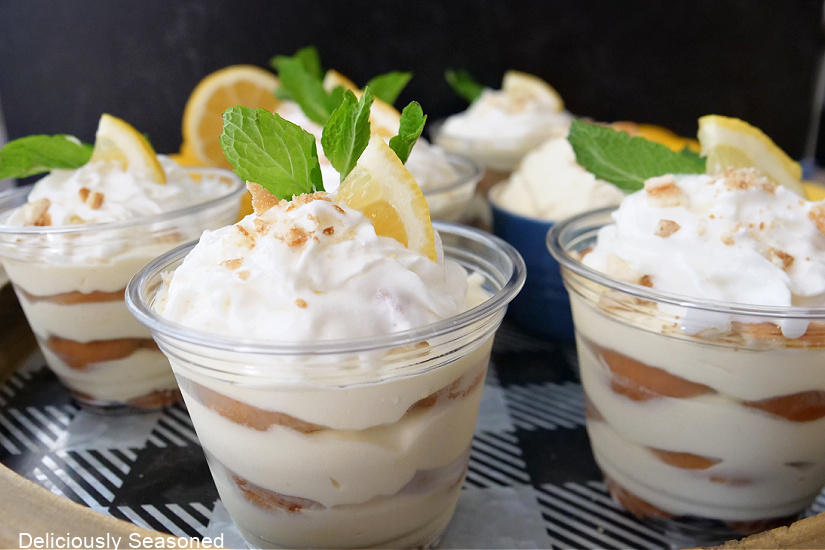 A horizontal photo of 3 pudding parfaits.