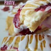 A close up of a slice of raspberry cream cheese pastry.