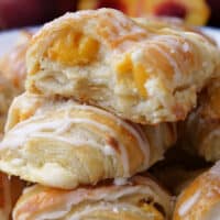 A close up of peach puff pastries.