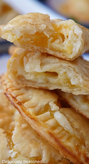 A close up of flaky nectarine hand pies.