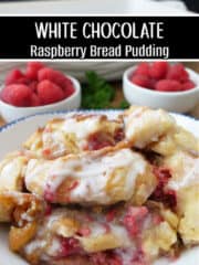 A white bowl filled with white chocolate raspberry bread pudding.