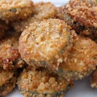 A close up of fried zucchini chips.