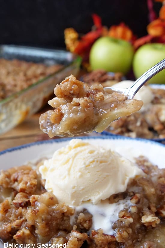 A spoonful of apple crumble.