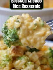 A spoonful of broccoli, cheese, and rice.