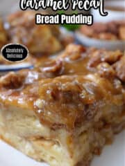 A serving of caramel pecan bread pudding on a white plate with blue trim.