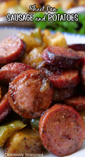 A close up of sliced smoked sausages and diced potatoes.