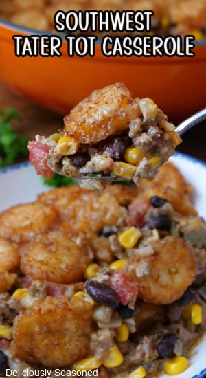 A spoonful of tater tot casserole with the title of the recipe at the top of the photo.