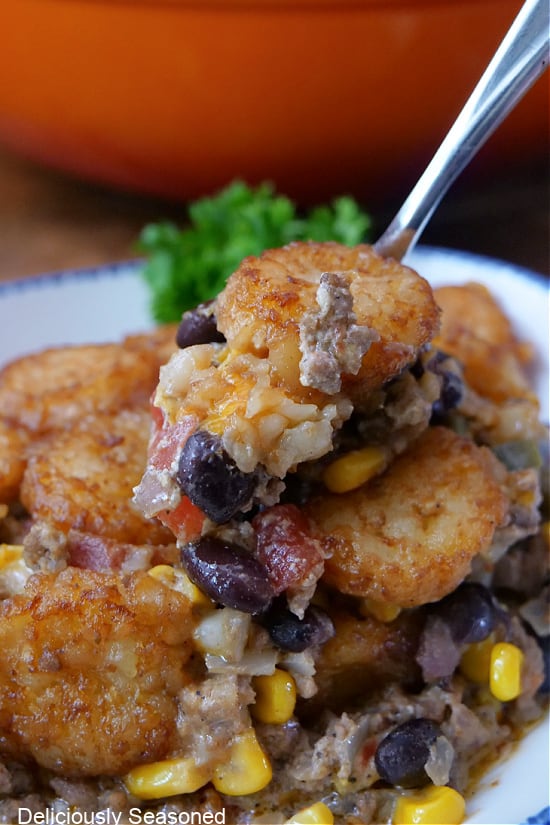 A spoonful of tater tot casserole.