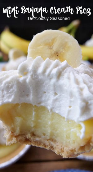 A mini banana cream pie with a bite taken out of it, and the title of the recipe at the top of the photo.