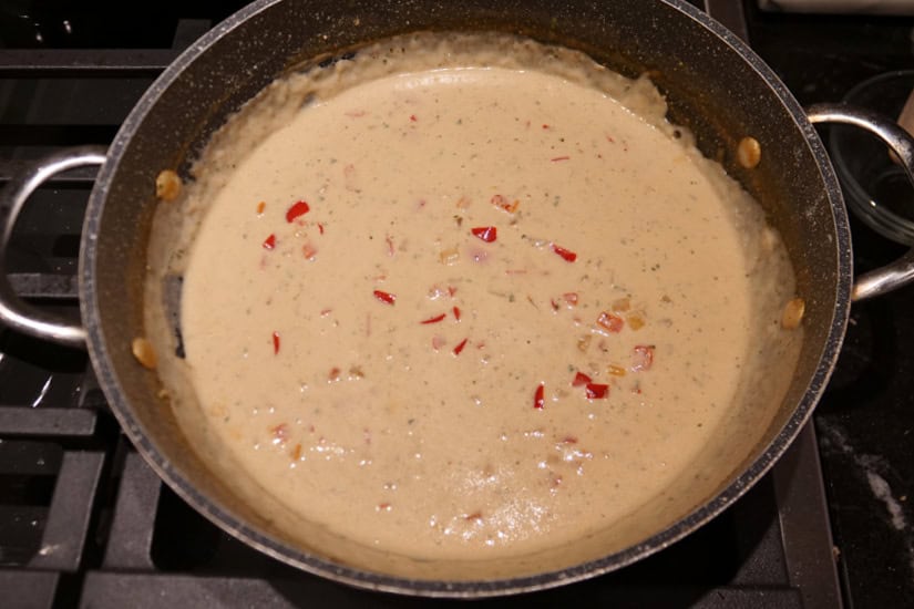 A pan with the creamy sauce in it.