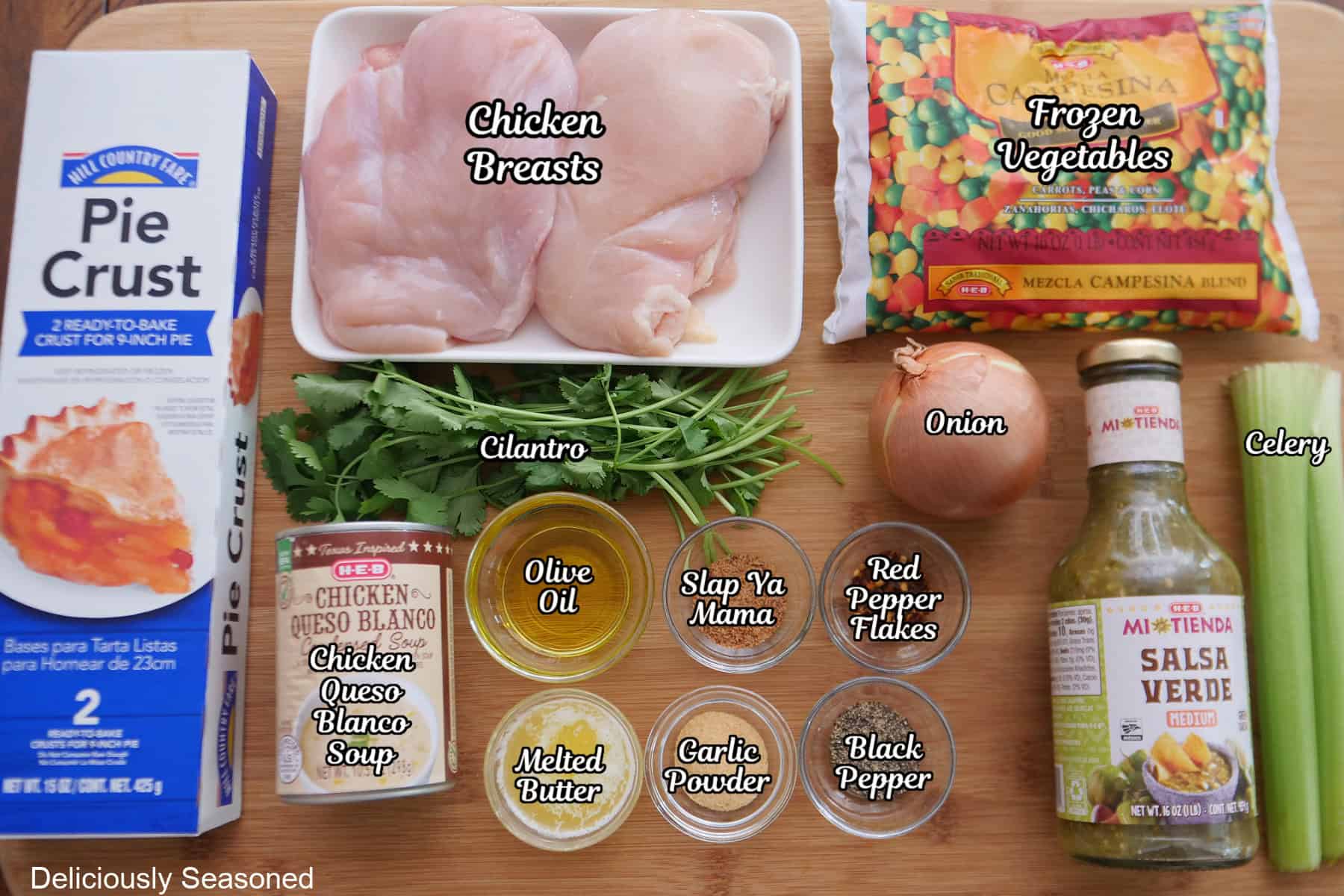 All the ingredients on a wood surface to make salsa verde chicken pot pie.